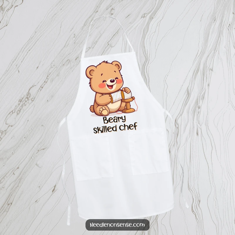 Funny Bear Sewing Apron, showing a bear cub enthusiastically hammering a spool, wearing a thimble, ideal for protecting clothes.