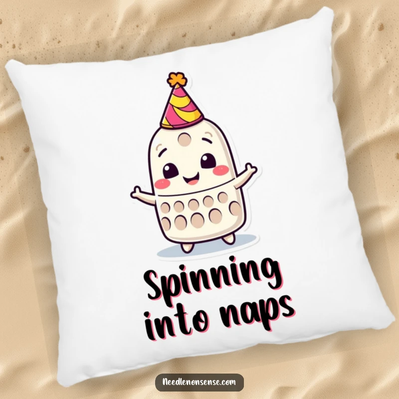 Funny pillow with a smiling thimble character wearing a party hat, spinning joyfully, perfect for a festive touch.