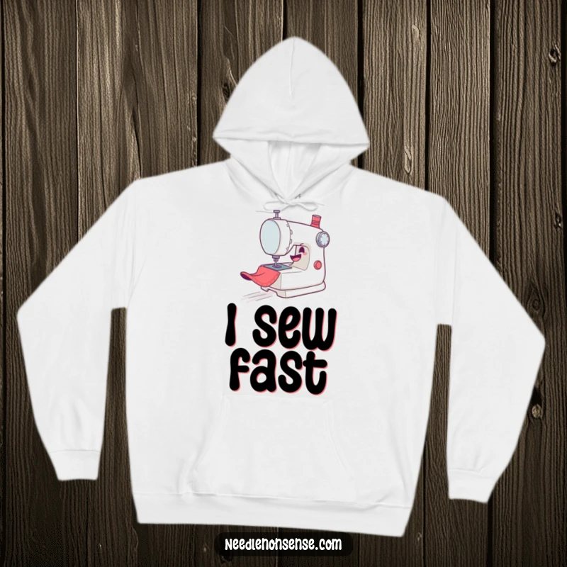 Funny Hoodie: A mischievous sewing machine character zooms gleefully across fabric, offering warmth and sewing humor.