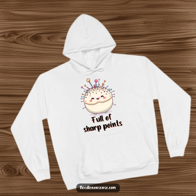 Funny pincushion character hoodie, loaded with tiny, sparkling pins, offering cozy humor for sewing lovers.