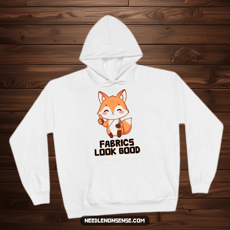 Funny Fox Sewing Hoodie, featuring a happy fox with a sewing pin, giving a thumbs up, embodying crafty warmth.