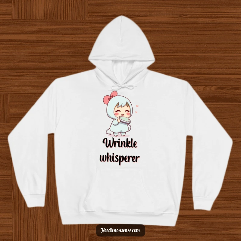 Funny hoodie depicting a blushing character humorously attempting to iron a wrinkle out of thin air, evoking laundry day comedy.