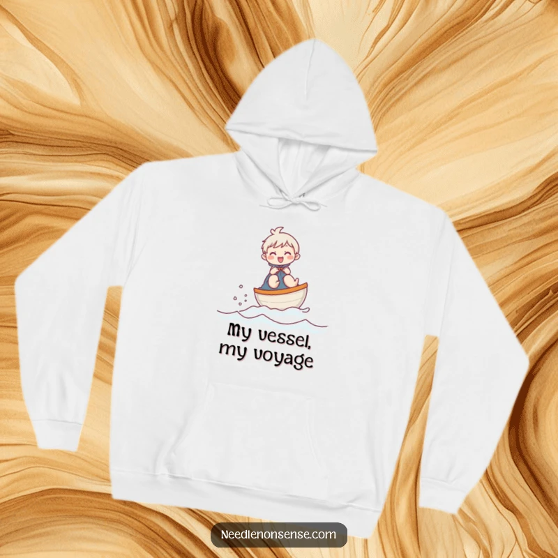 Funny hoodie depicting a joyful character sailing a thimble boat across fabric, offering warmth and humorous charm.