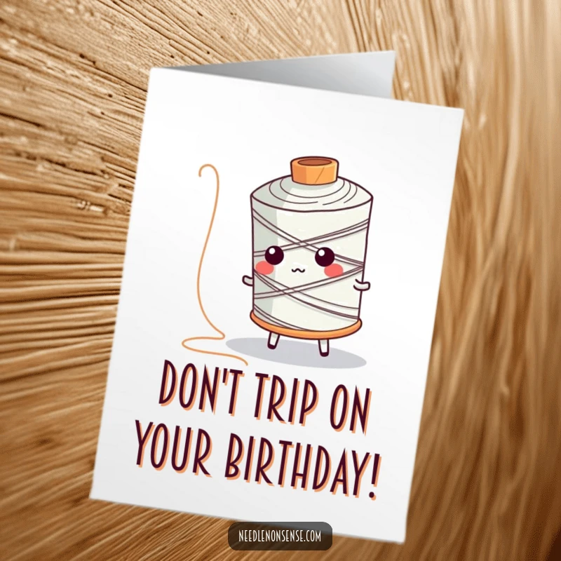 Funny Free Printable Birthday Card: Spool of thread character comically tripping over its own long thread.