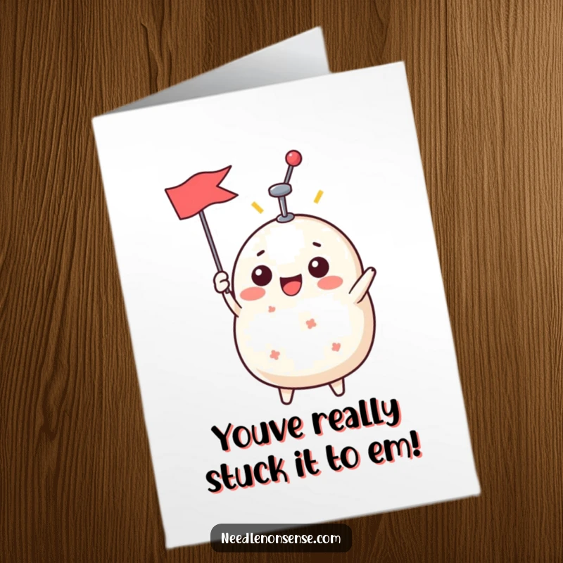 Funny Free Printable Congratulations Card featuring a beaming pin cushion character with a raised pin signifying victory.