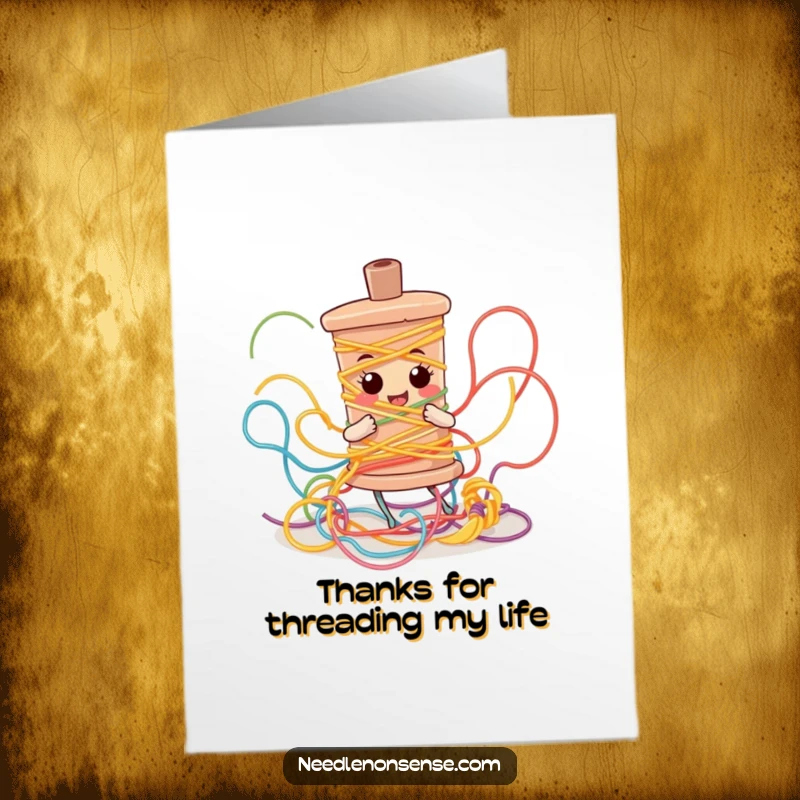 Funny Free Printable Thank You Card: A bobbin character hilariously ensnared in a chaotic swirl of colorful thread.