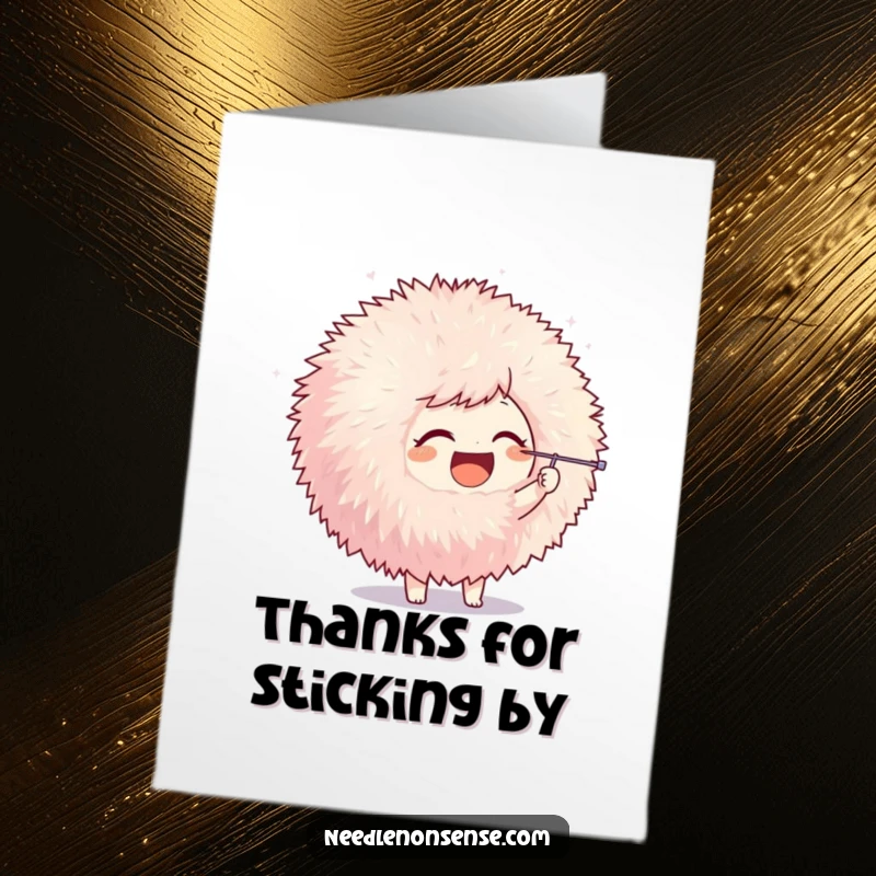 Funny Free Printable Thank You Card: Joyful character playfully poking a giant pom-pom with a needle, a cute thank you.
