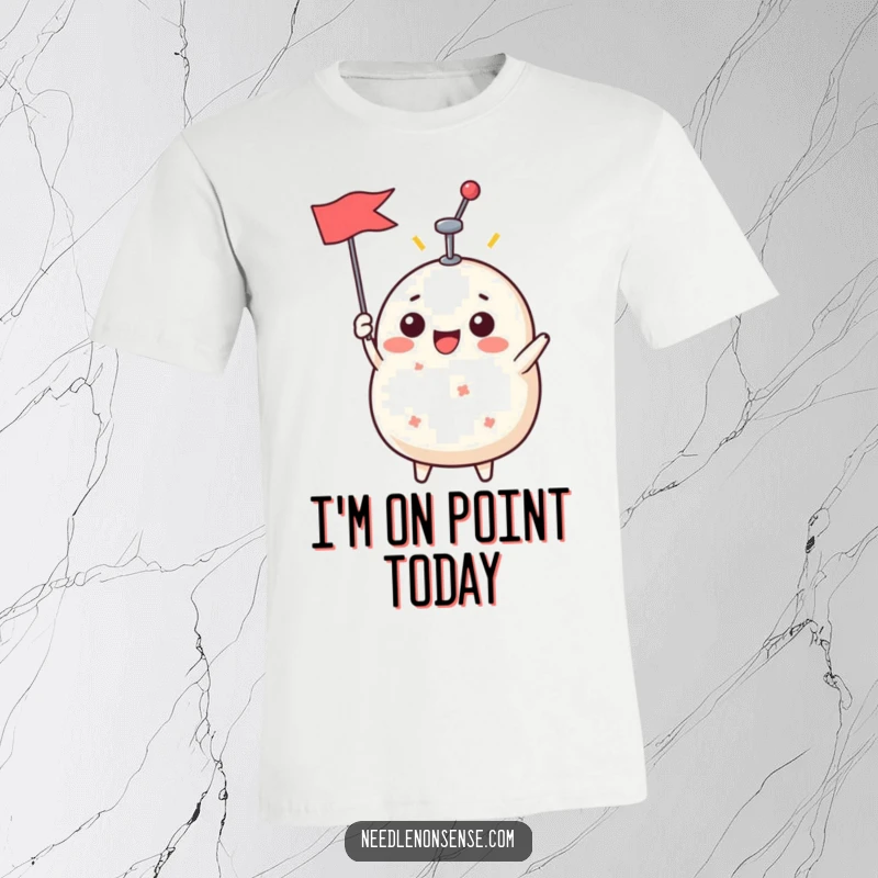 Funny T-Shirt with a cheerful pin cushion character holding a pin high like a flag, symbolizing achievement and sewing accomplishment.