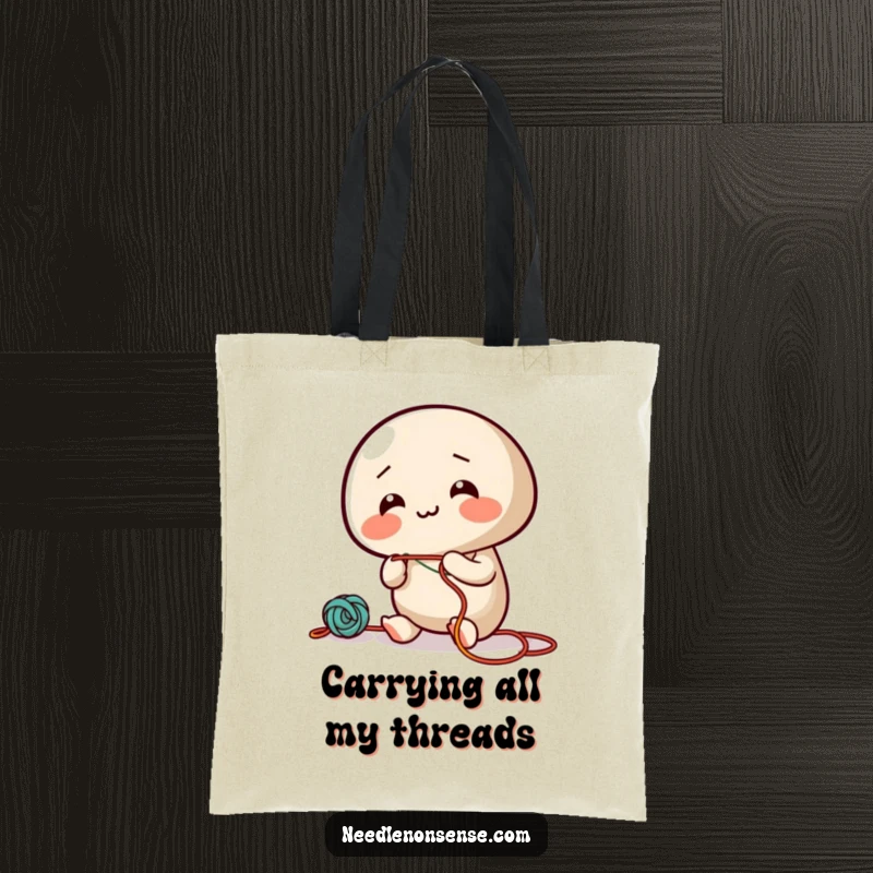 Funny tote bag featuring a giggling needle character enthusiastically threading colorful string, ideal for carrying supplies.