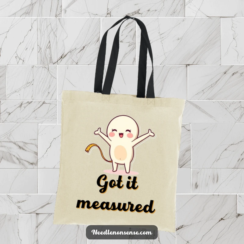 Funny tote bag with a whimsical measuring tape character stretching out, ideal for carrying crafting supplies with a humorous touch.